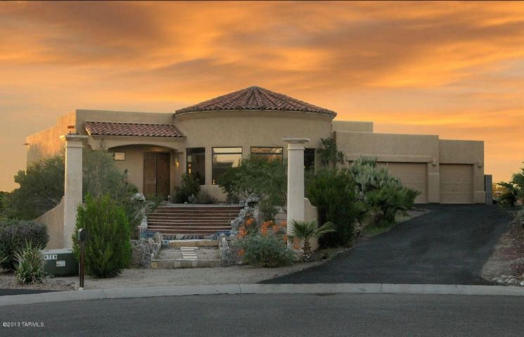 Modern home curved roof desert